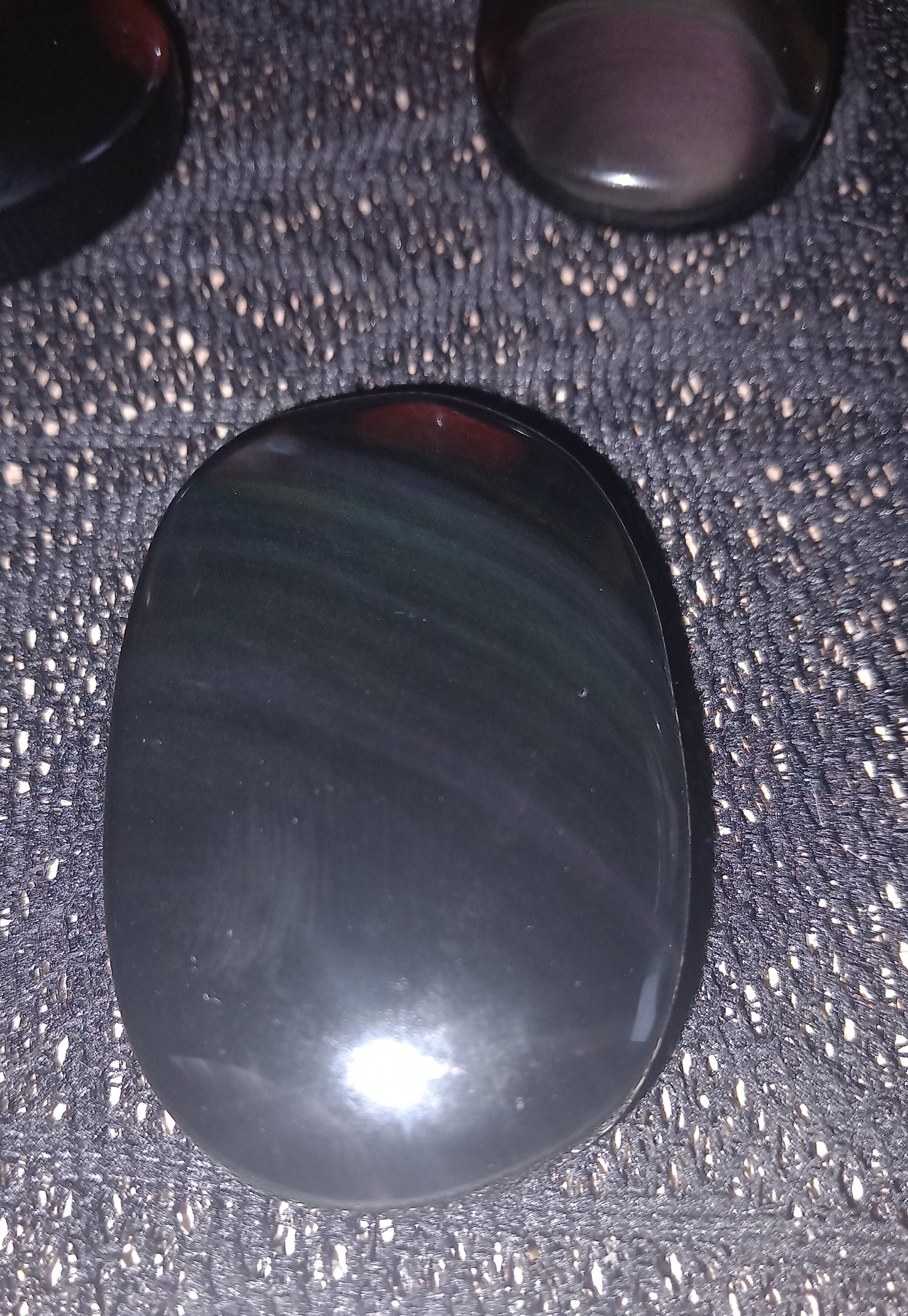 Obsidian rainbow palm stones
